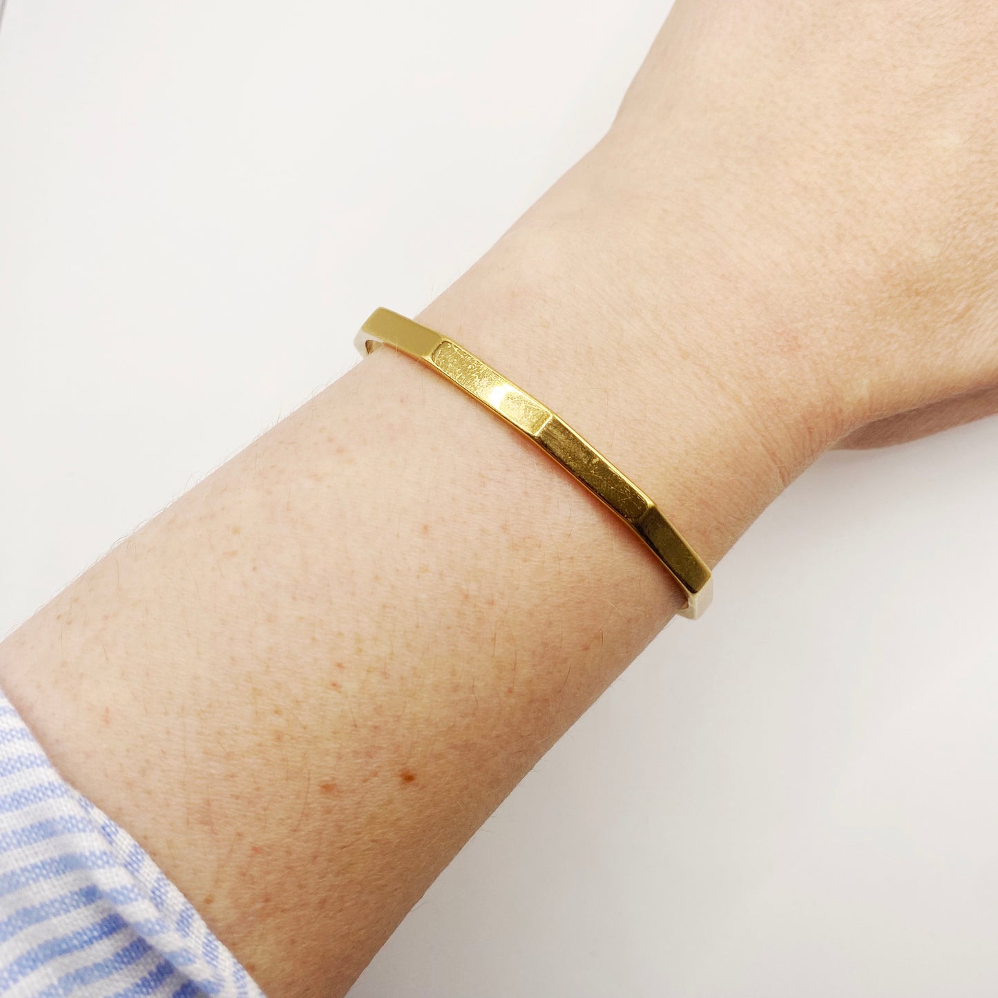 Vintage 1970s Monet articulated bangle in gold tone, mid-century costume jewellery