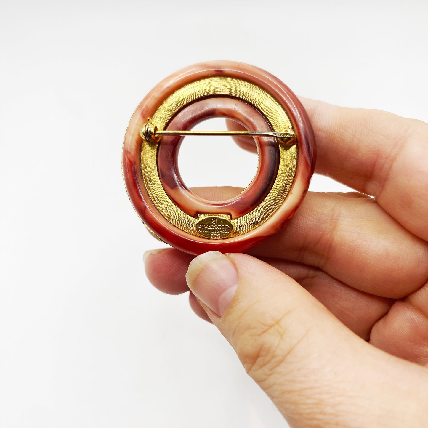 Gold-tone coral glass brooch by Givenchy from 1979 collection
