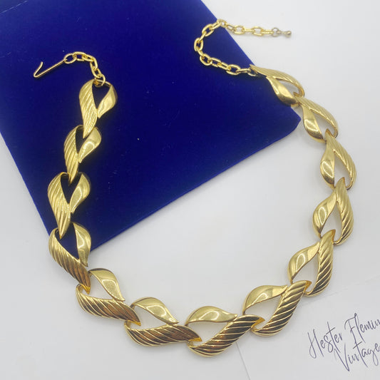 Flat lay of 1970s Trifari Heart Necklace