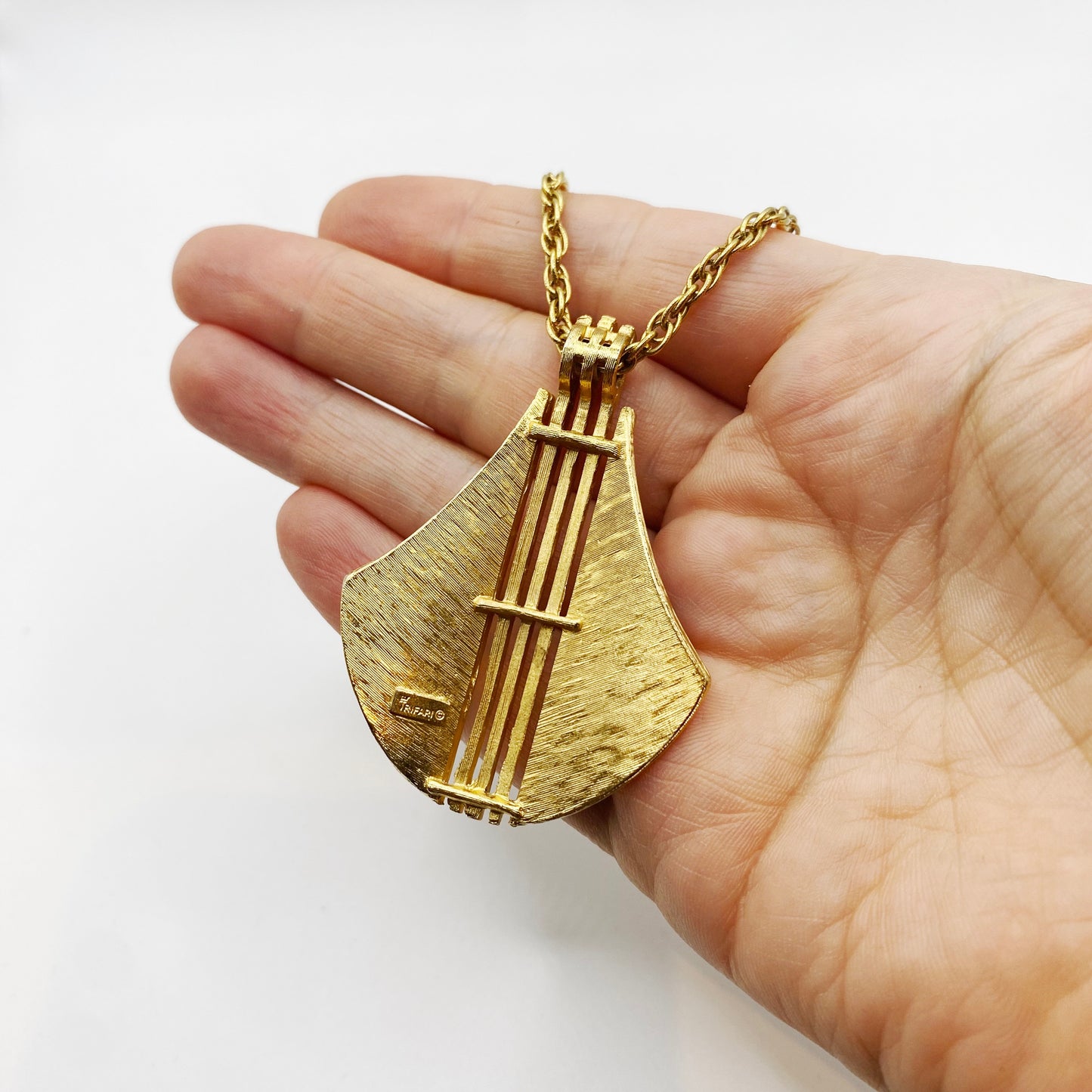 Signed Trifari vintage necklace with sculptural pendant