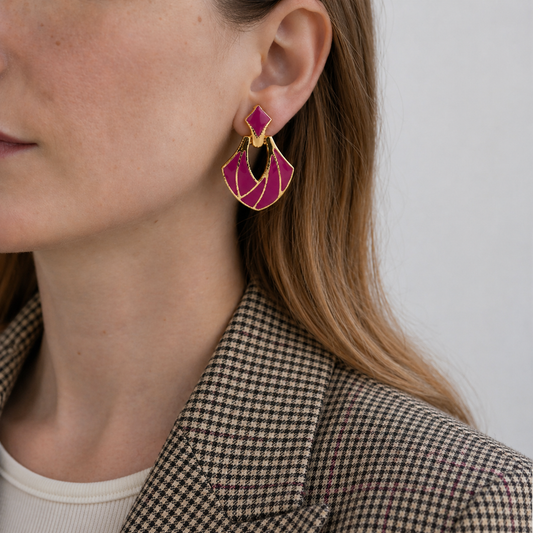 1980s Deco Style Magenta Earrings, styled on a model with a retro jacket.