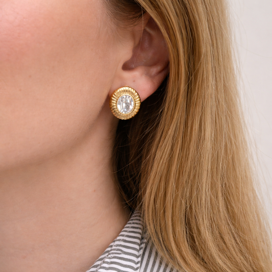 Style shot of vintage 1980s Trifari crystal earrings.