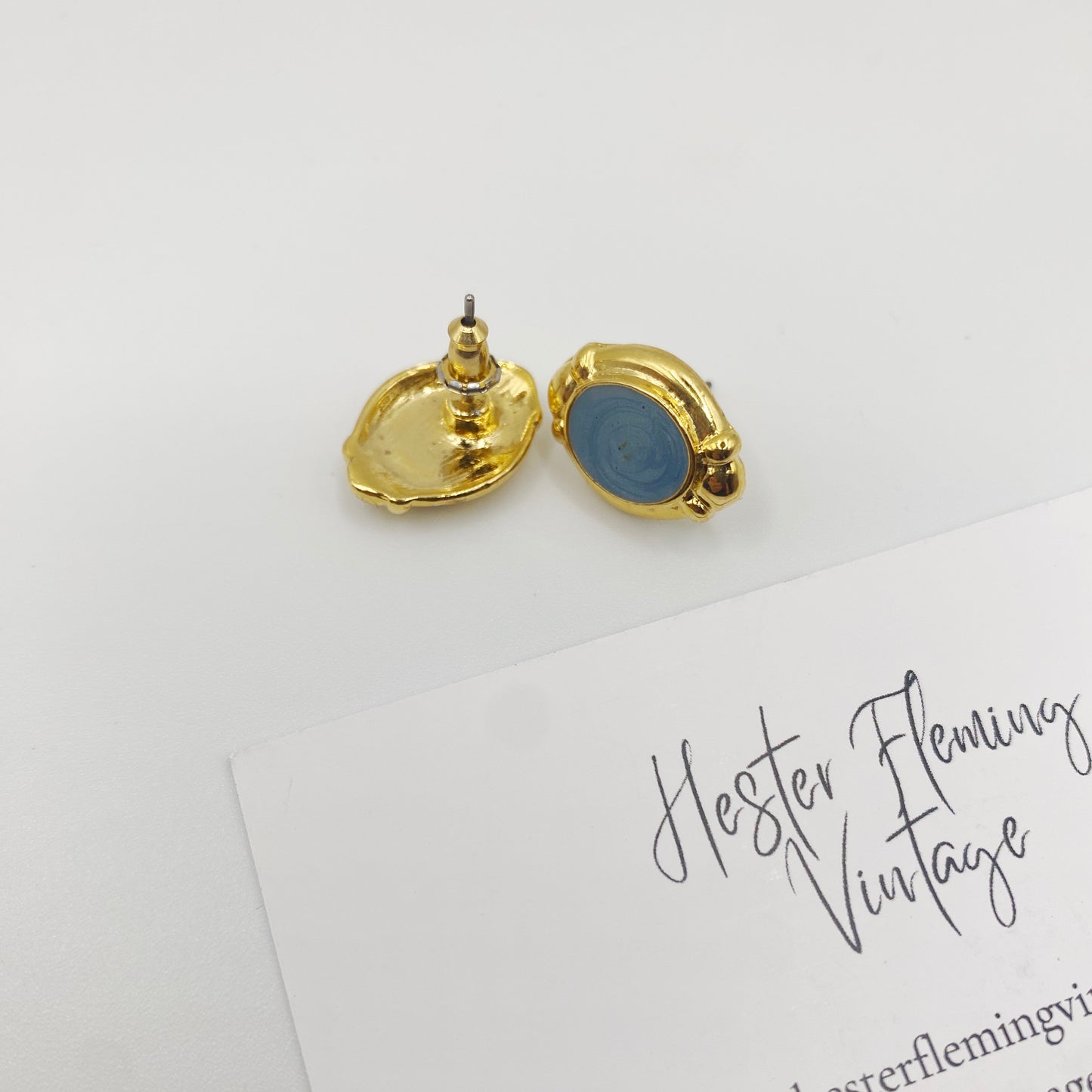 Back view of 90s vintage stud earrings showing pierced ear fitting and pristine condition