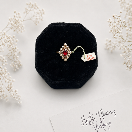 Circa, 1940s. A Boujour Munidor Ruby victorian revival ring.