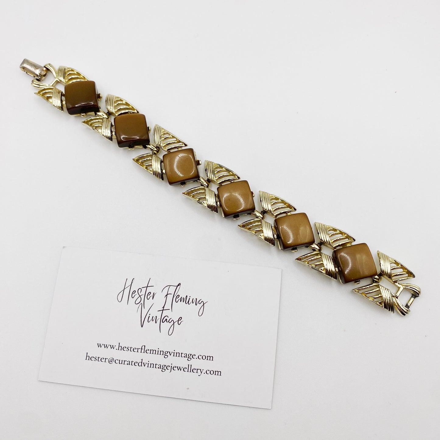 Mid Century Coro Bracelet Flatlay on white background.