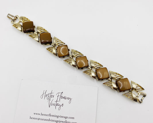 Mid Century Coro Bracelet Flatlay on white background.