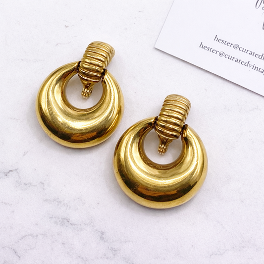 1970s vintage Monet doorknocker earrings.