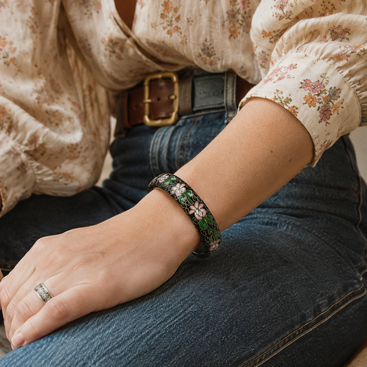 Model wearing 70s Cloisonne' floral bangle with a floral shirt and jeans.