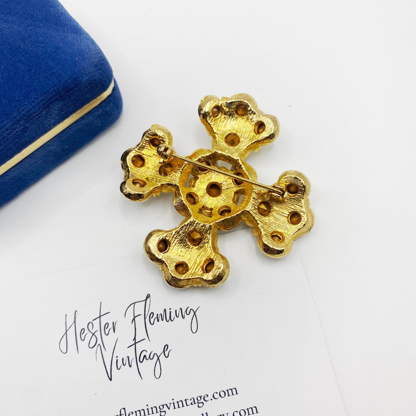 Back of gold-plated finish and Swarovski crystal detailing on 1980s Maltese Cross brooch.