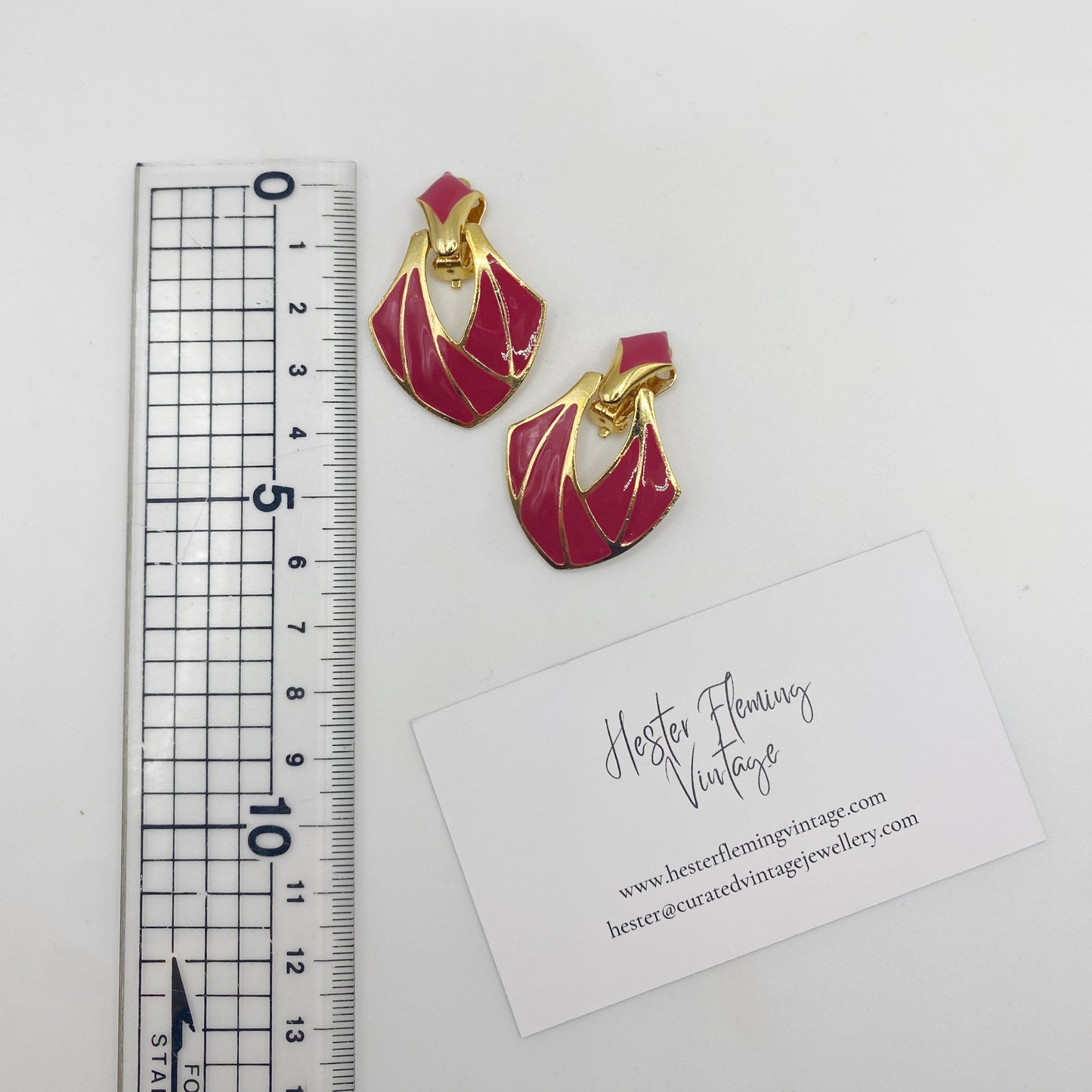 Measurement of bold 80s vintage earrings.