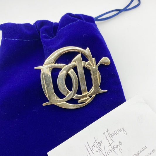 Vintage Christian Dior CD monogram brooch in gilt metal, front view