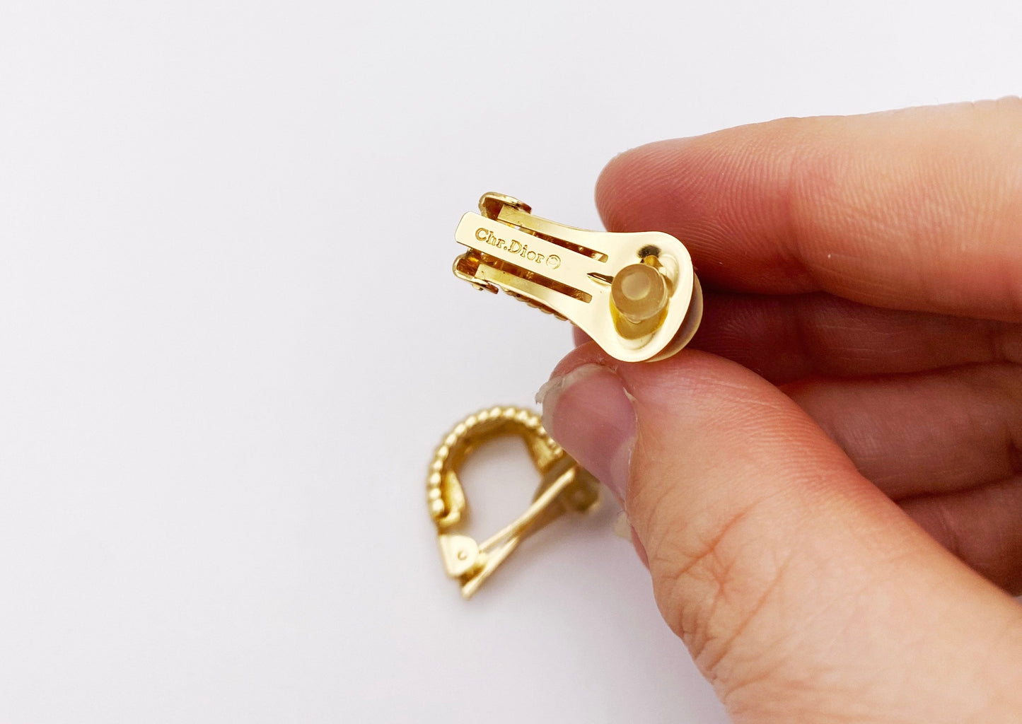 Signature Chr. Dior stamp on vintage clip-on earrings