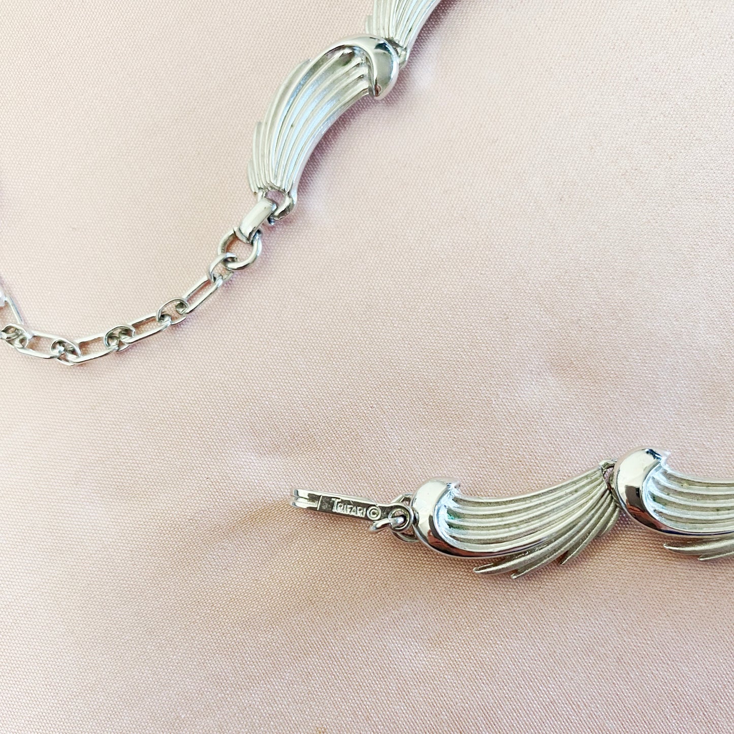 Signed Crown Trifari 1950s silver leaf necklace, authentic vintage jewellery piece.