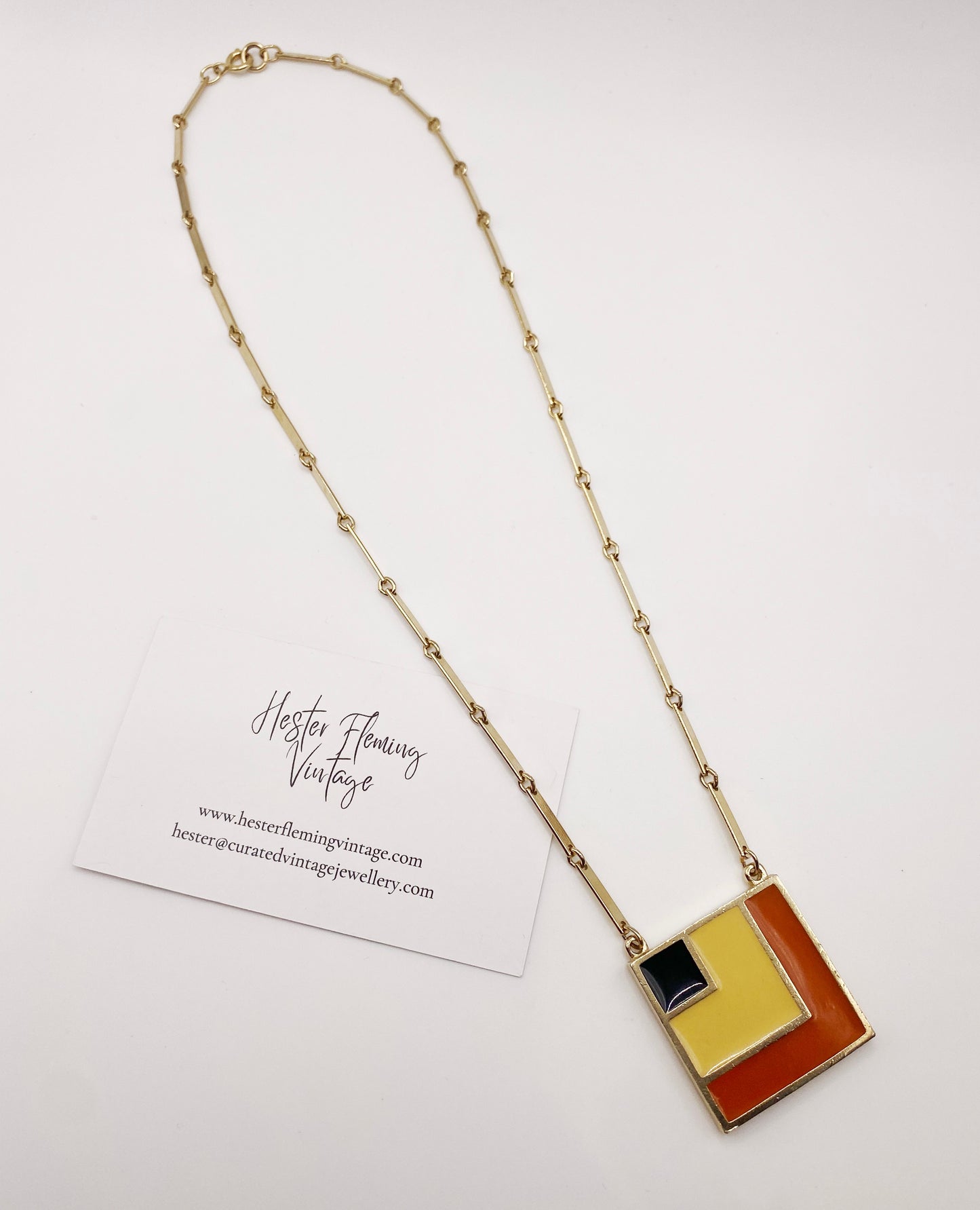 Collectible retro Sarah Coventry necklace, 3cm goldtone enamel square pendant with chain.