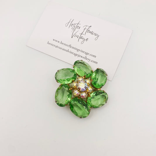 Vintage Juliana D&E brooch with green uranium glass and AB crystals in goldtone setting.