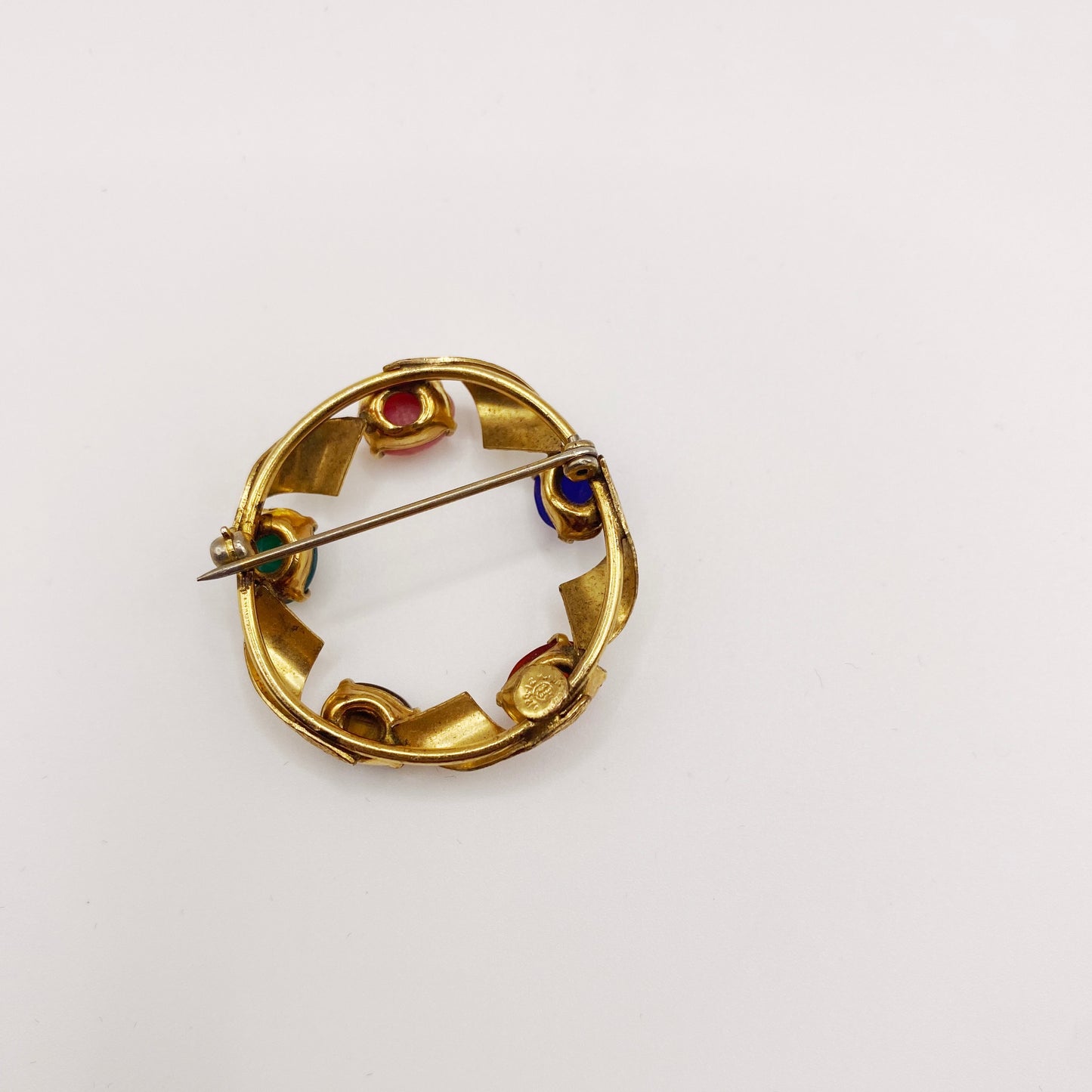 Back of 1960s vintage scarab brooch showing clasp and excellent condition, signed mid-century piece.