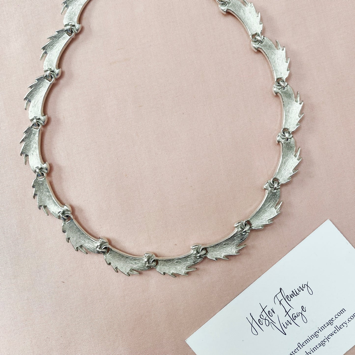 Back view of vintage Trifari silver-tone leaf necklace, mid-century costume jewellery