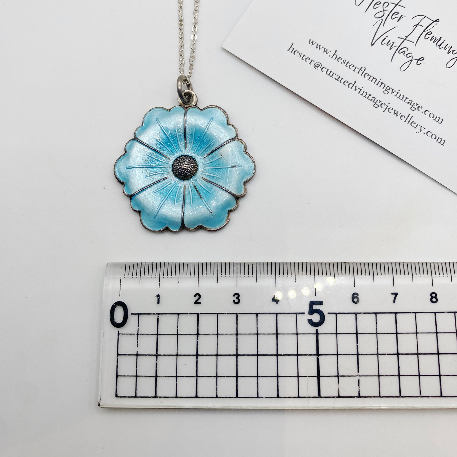 1950s Danish enamel pansy pendant shown for scale, approximately 45mm diameter