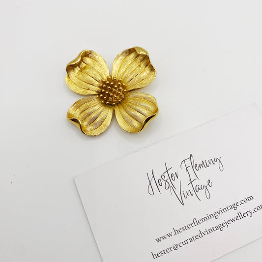 Front view of 1950s Trifari Dogwood brooch in 22kt gold plating