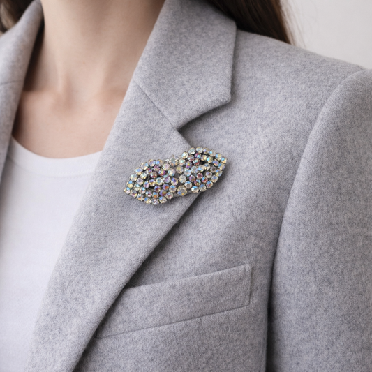 1950s AB Crystal Brooch, converts into dressclips, styled on a grey jacket. 