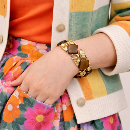 A style shot of the 1950s Coro thermoset bracelet, retro style. 
