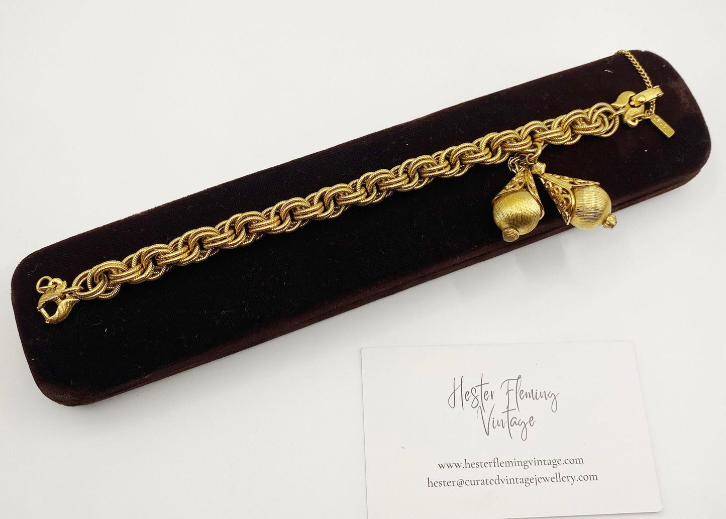1960s Monet Bolero Bracelet in textured goldtone, signed and collectible vintage designer piece.