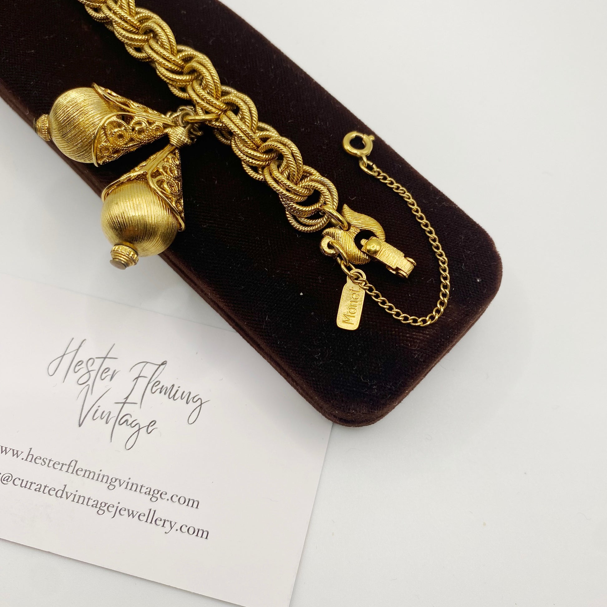1960s signed Monet Bolero bracelet, vintage goldtone collectible jewelry, close up. 