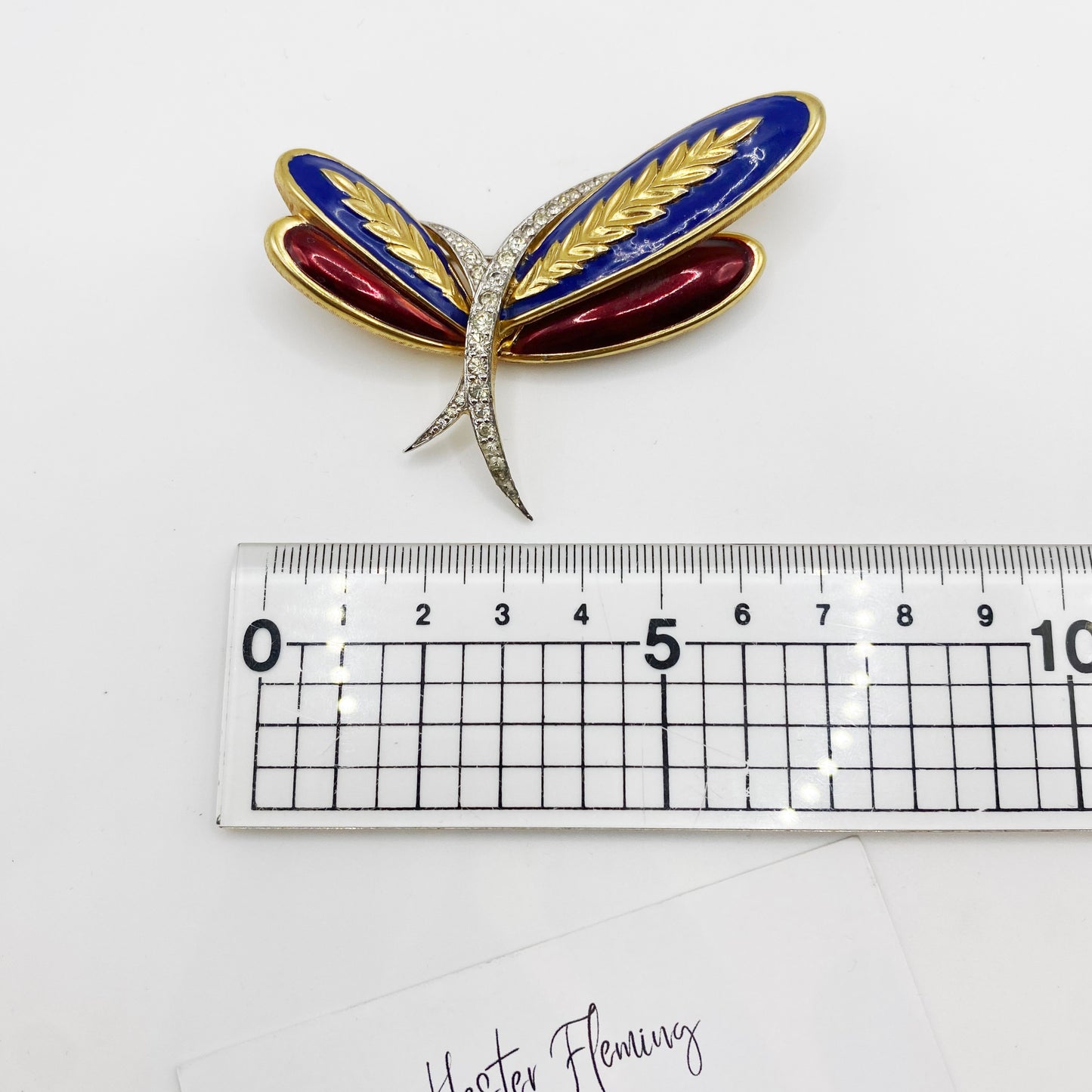 1960s 1970s Jomaz Brooch next to ruler for scale. 
