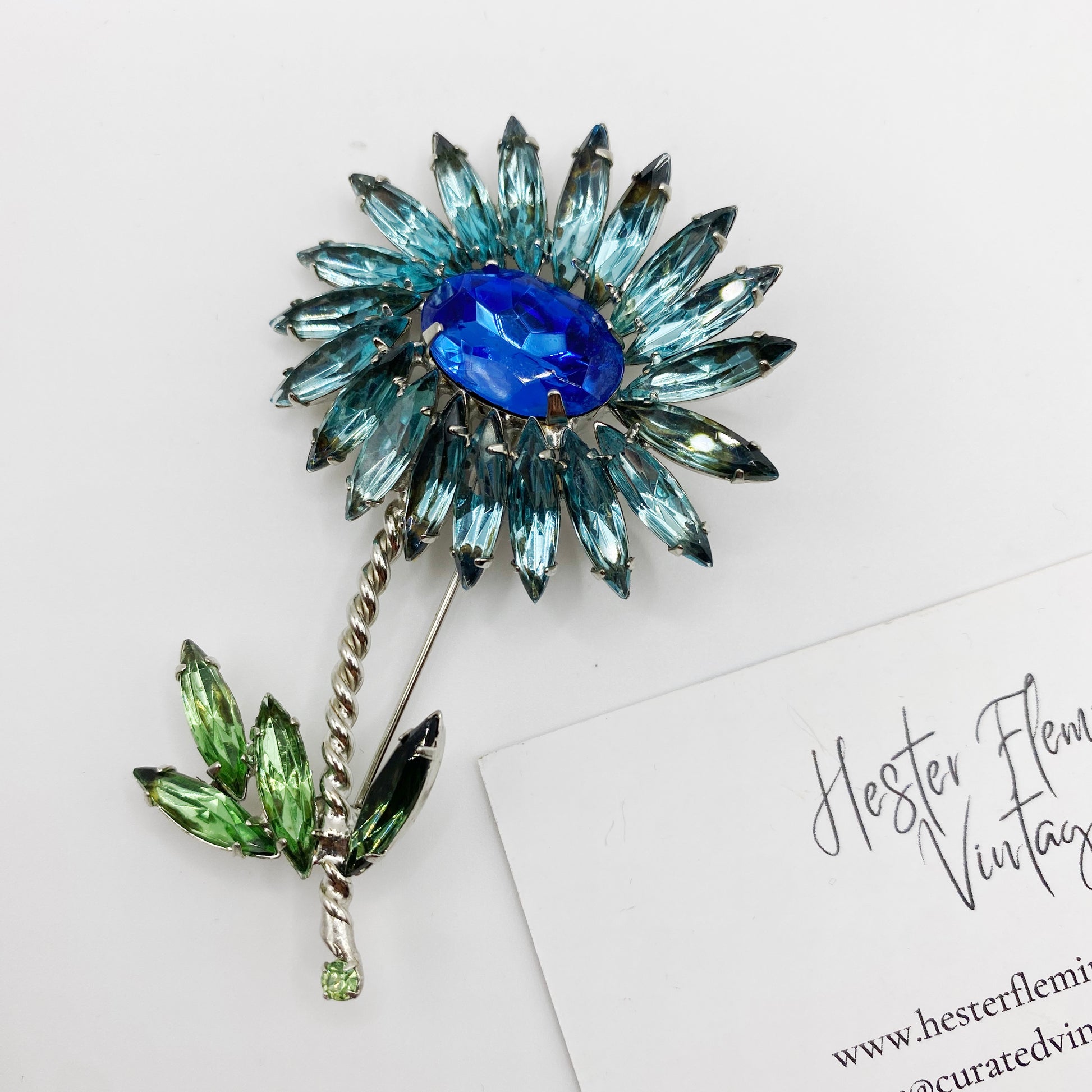 Close up of the 1960s Floral Rhinestone Brooch.