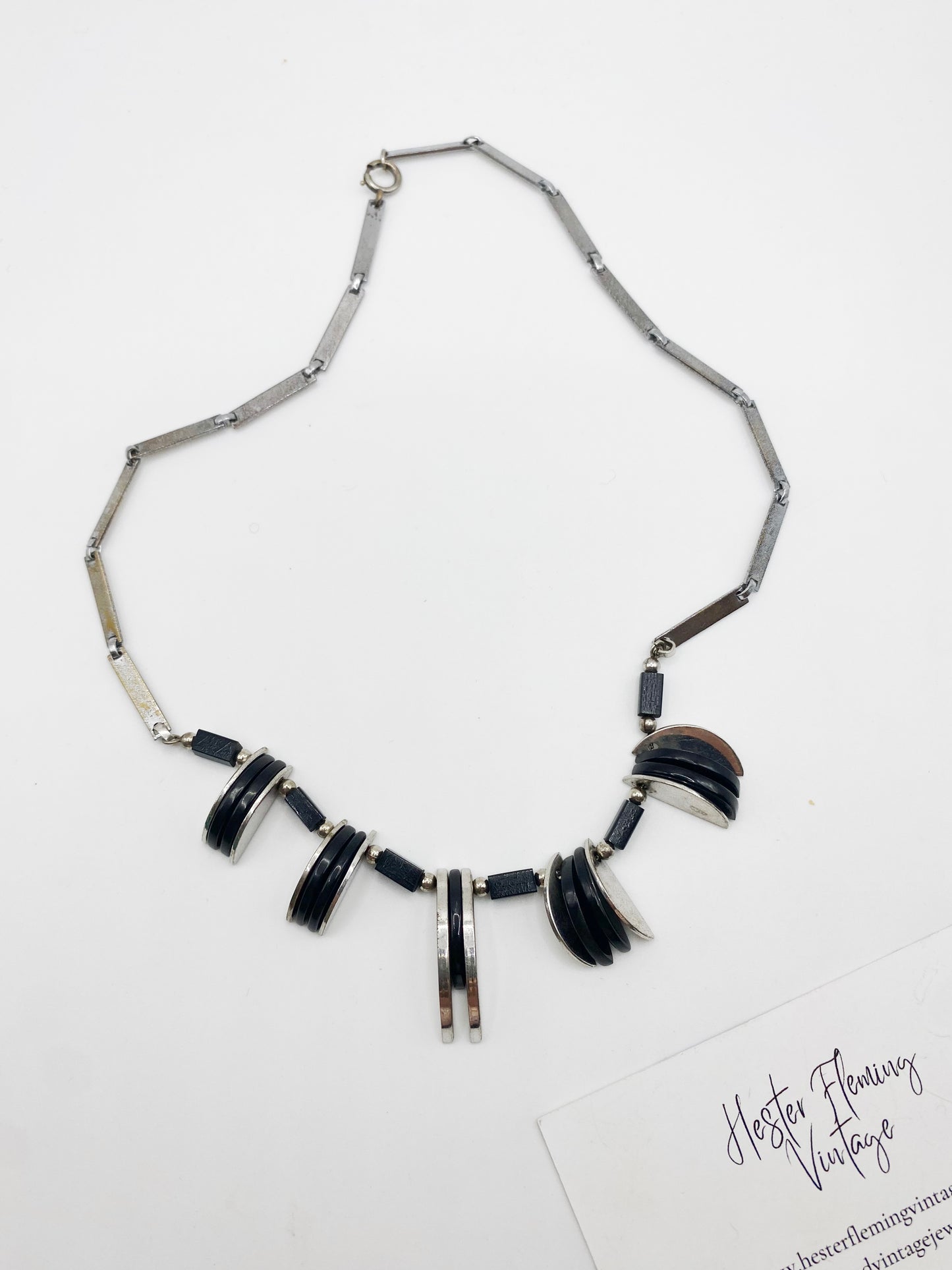 1960s MOD necklace, laid flat on white surface. 
