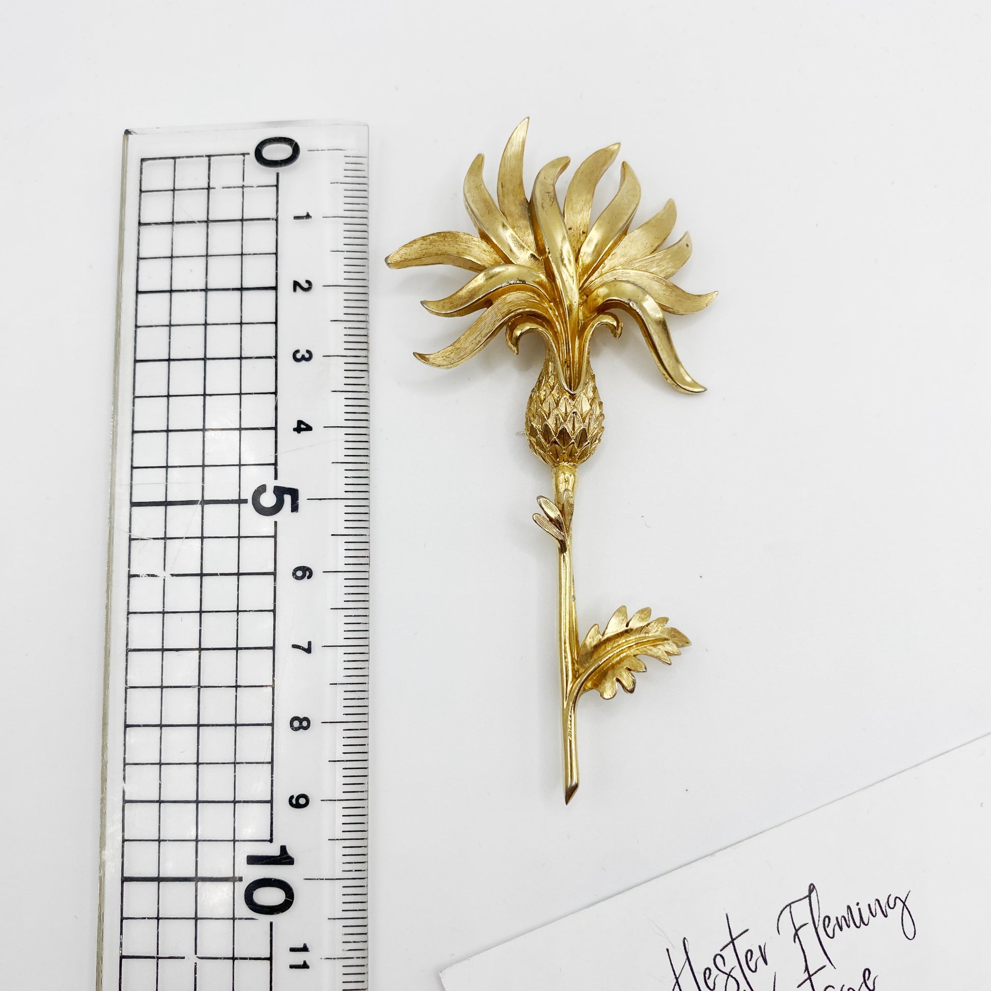 1960s Trifari Gold Tropical Flower Brooch, position next to ruler for measurement. 