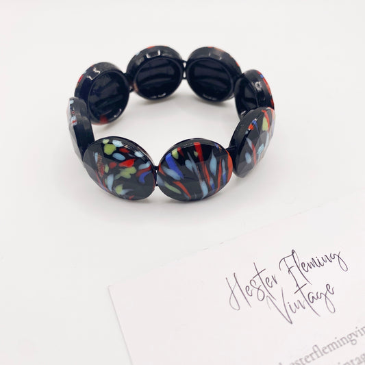 Close-up of jet black glass beads on 1970s French bracelet.