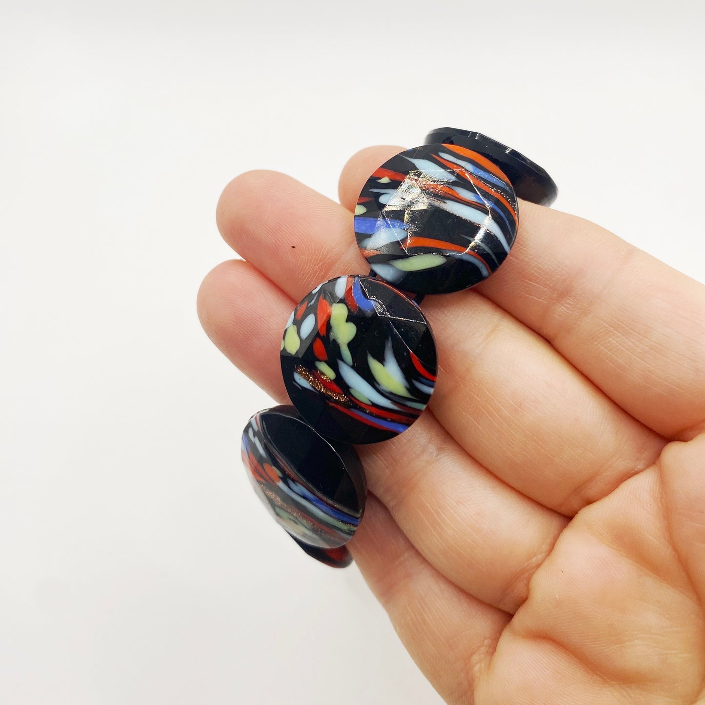 Detailed view of retro jet black glass bracelet