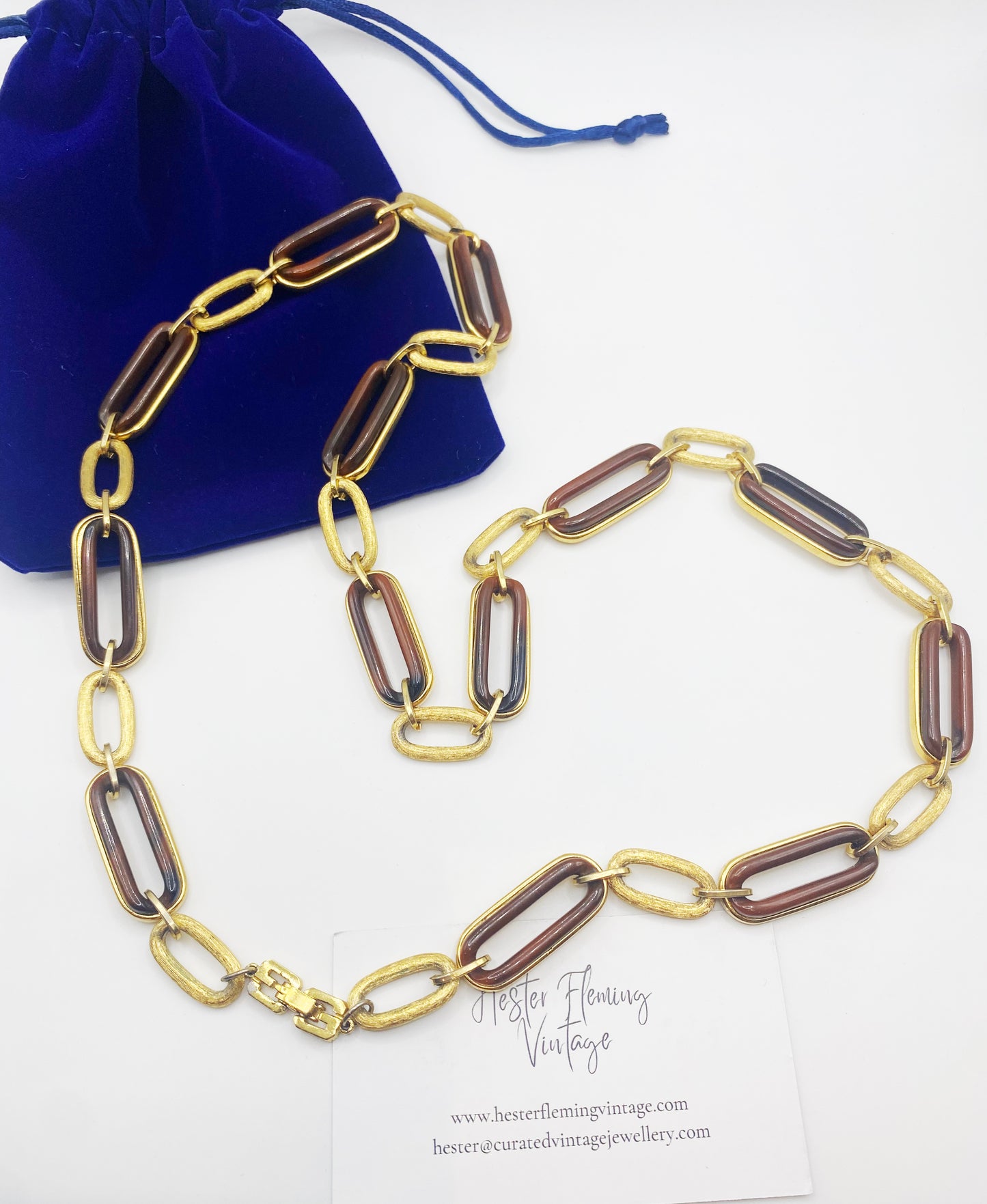 Full length 1970s Givenchy gold tone and tortoiseshell link necklace with alternating oval links.