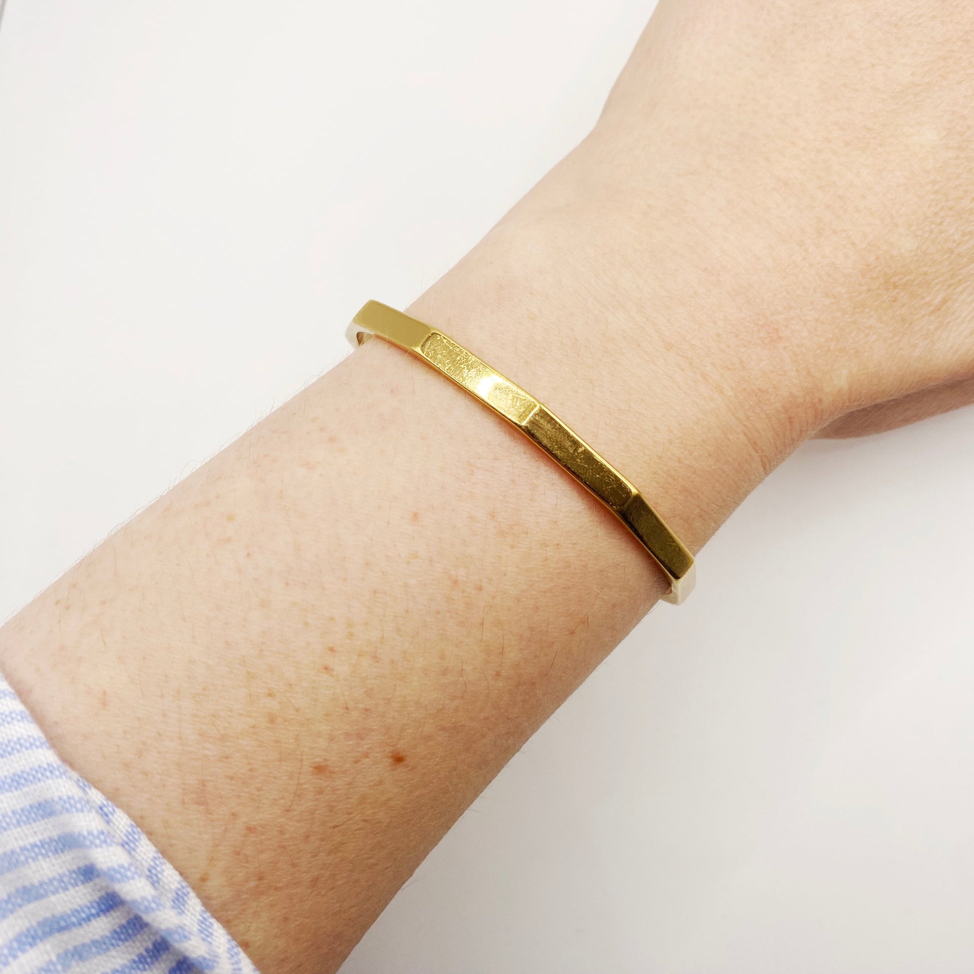 Vintage 1970s Monet articulated bangle in gold tone, mid-century costume jewellery