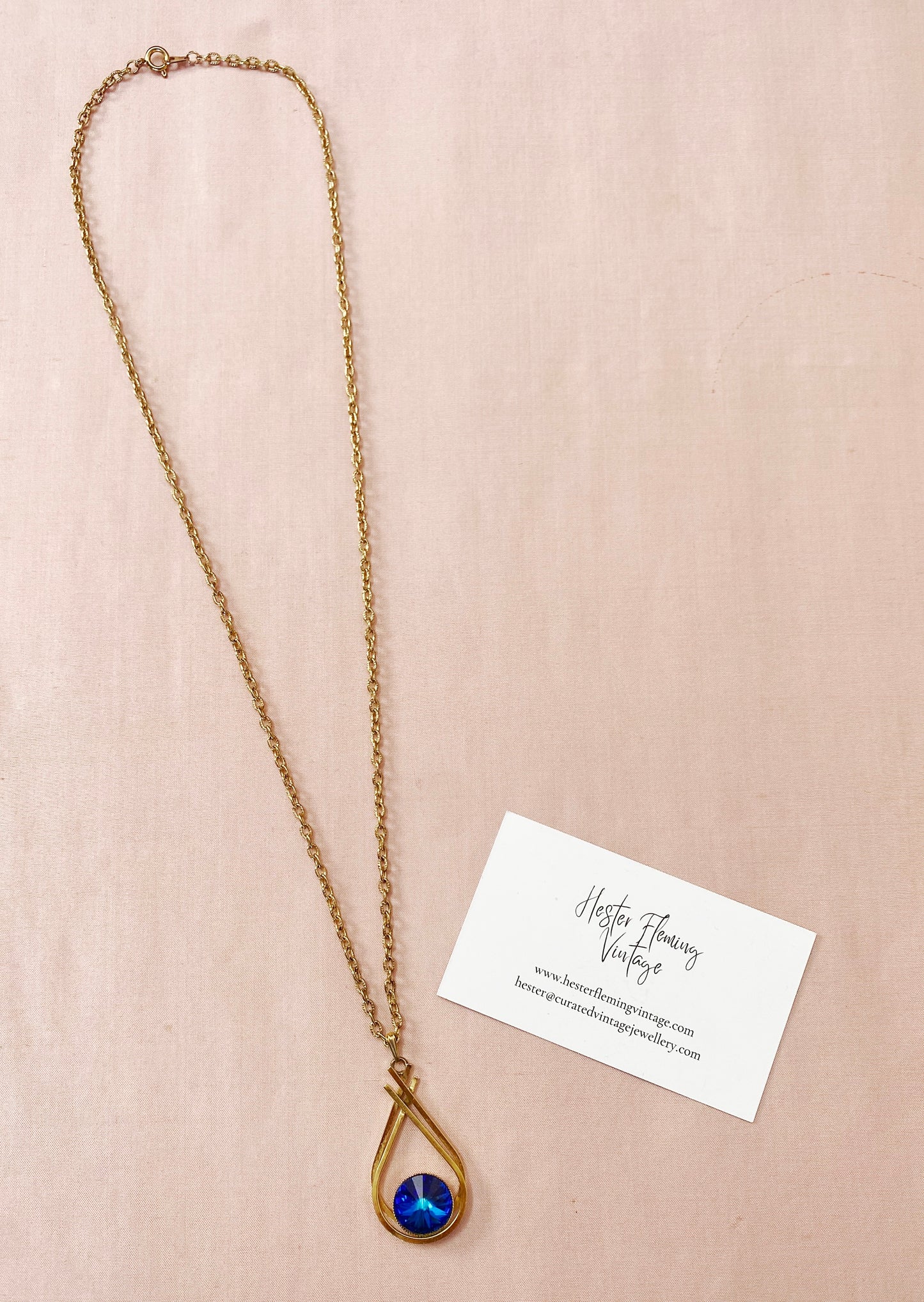 Retro 1970s statement pendant, goldtone with blue crystal, 63cm chain