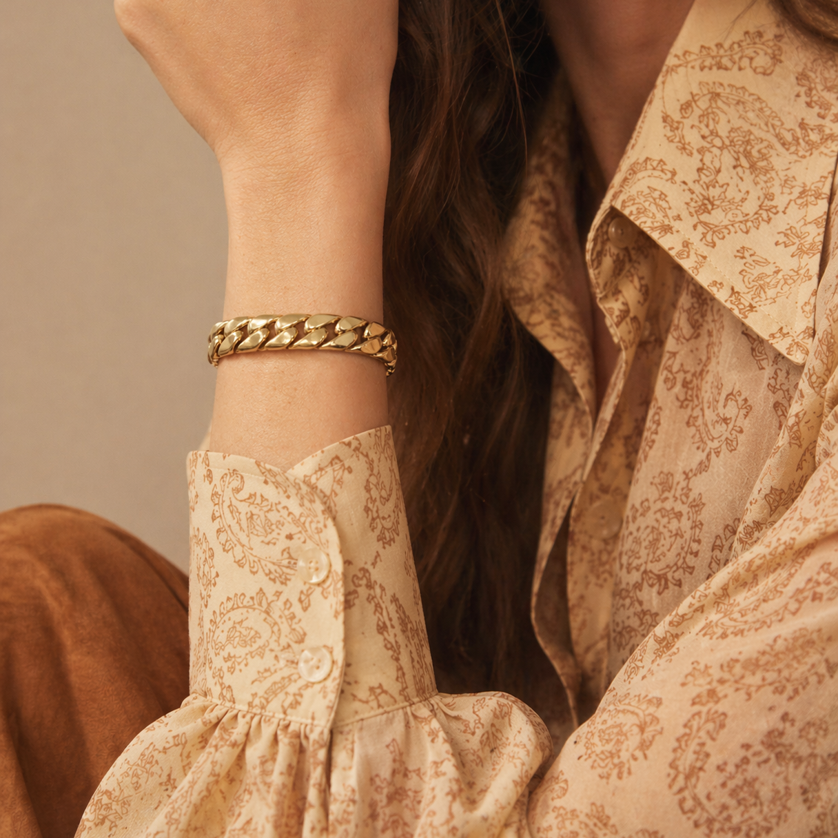 A 1970s Christian Dior Bracelet, styled on a model, wearing retro clothes. 
