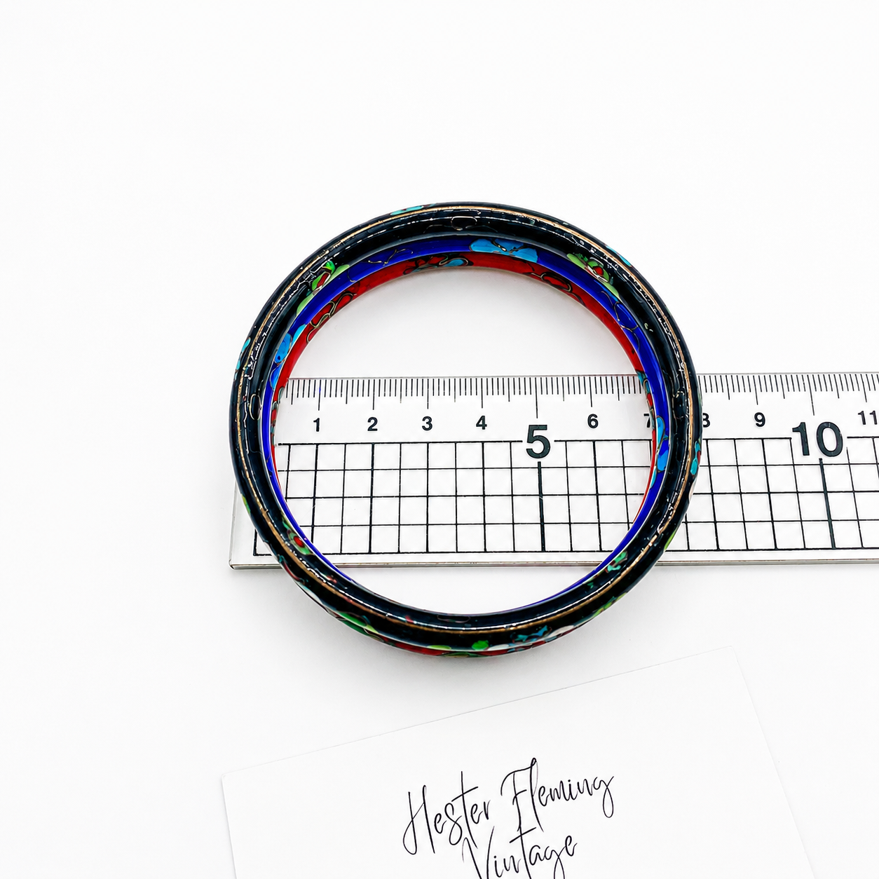 Shown on a ruler for size. 