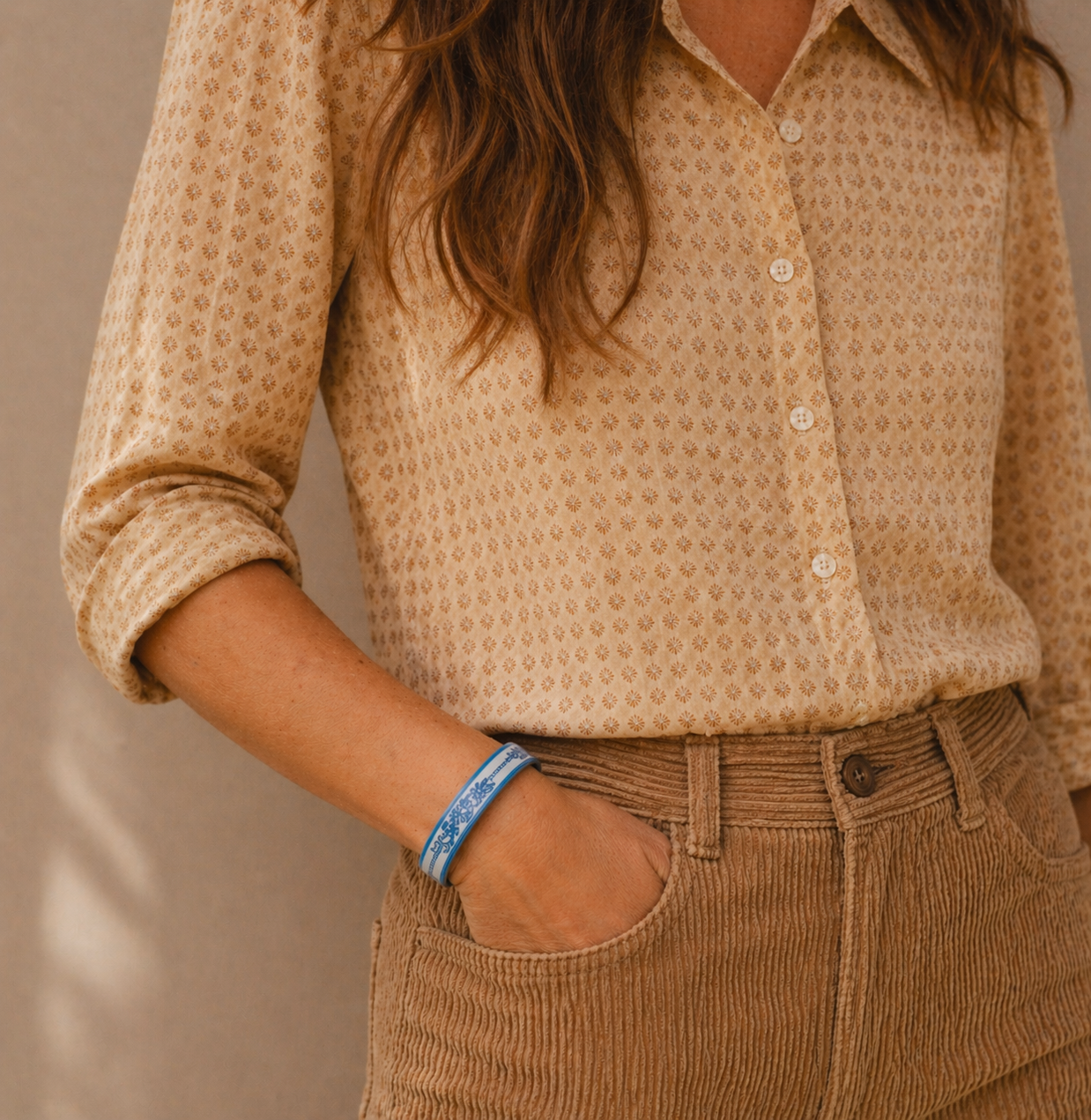 Vintage 1970s Michaela Frey bangle, styled on a model wearing retro clothes.