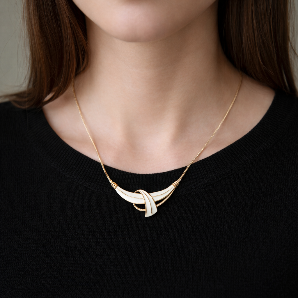 1970s Trifari Necklace, styled with a fine black knit. 