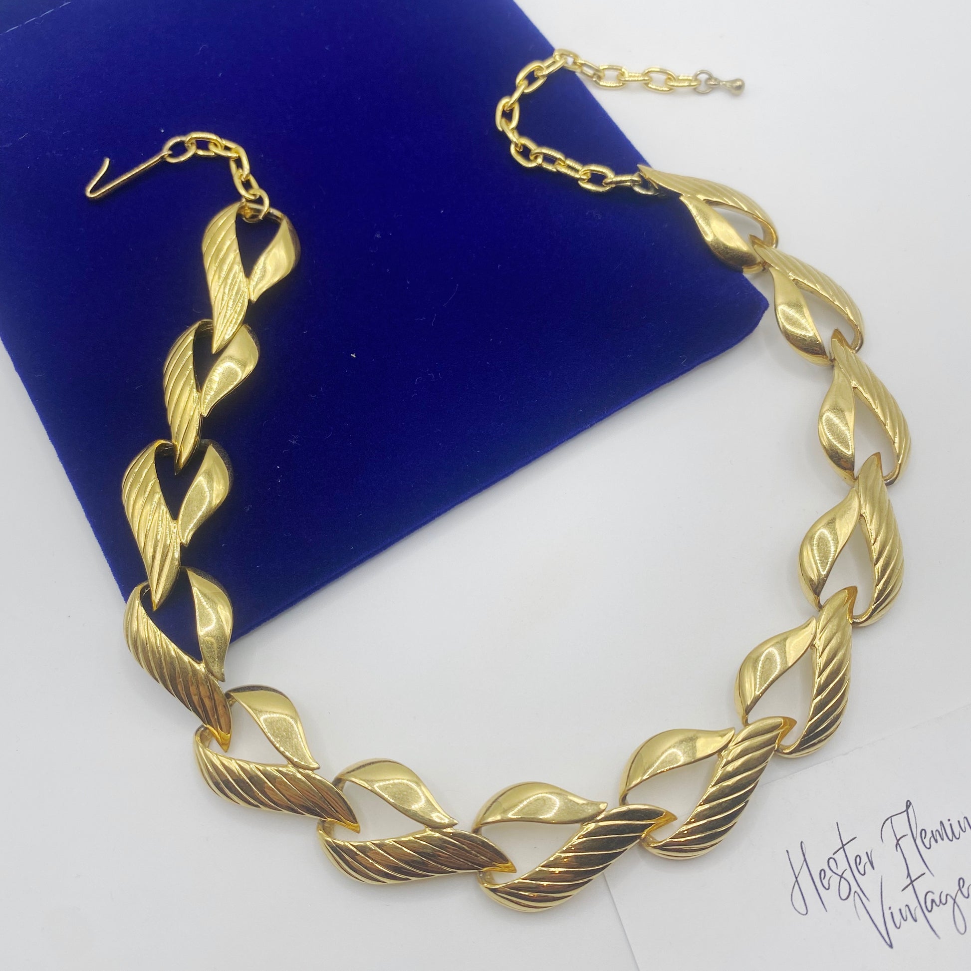 Flat lay of 1970s Trifari Heart Necklace