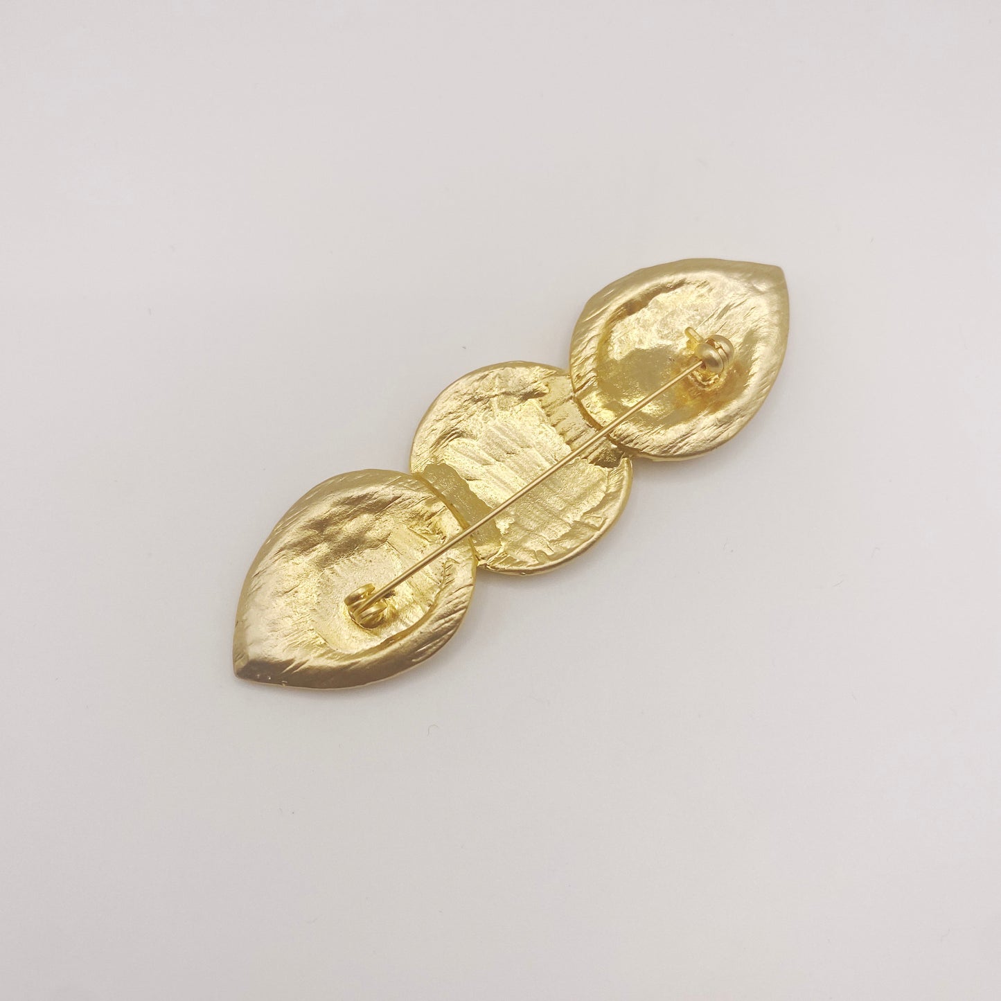 Back of vintage 1980s Egyptian Revival brooch showing clasp and excellent vintage condition.