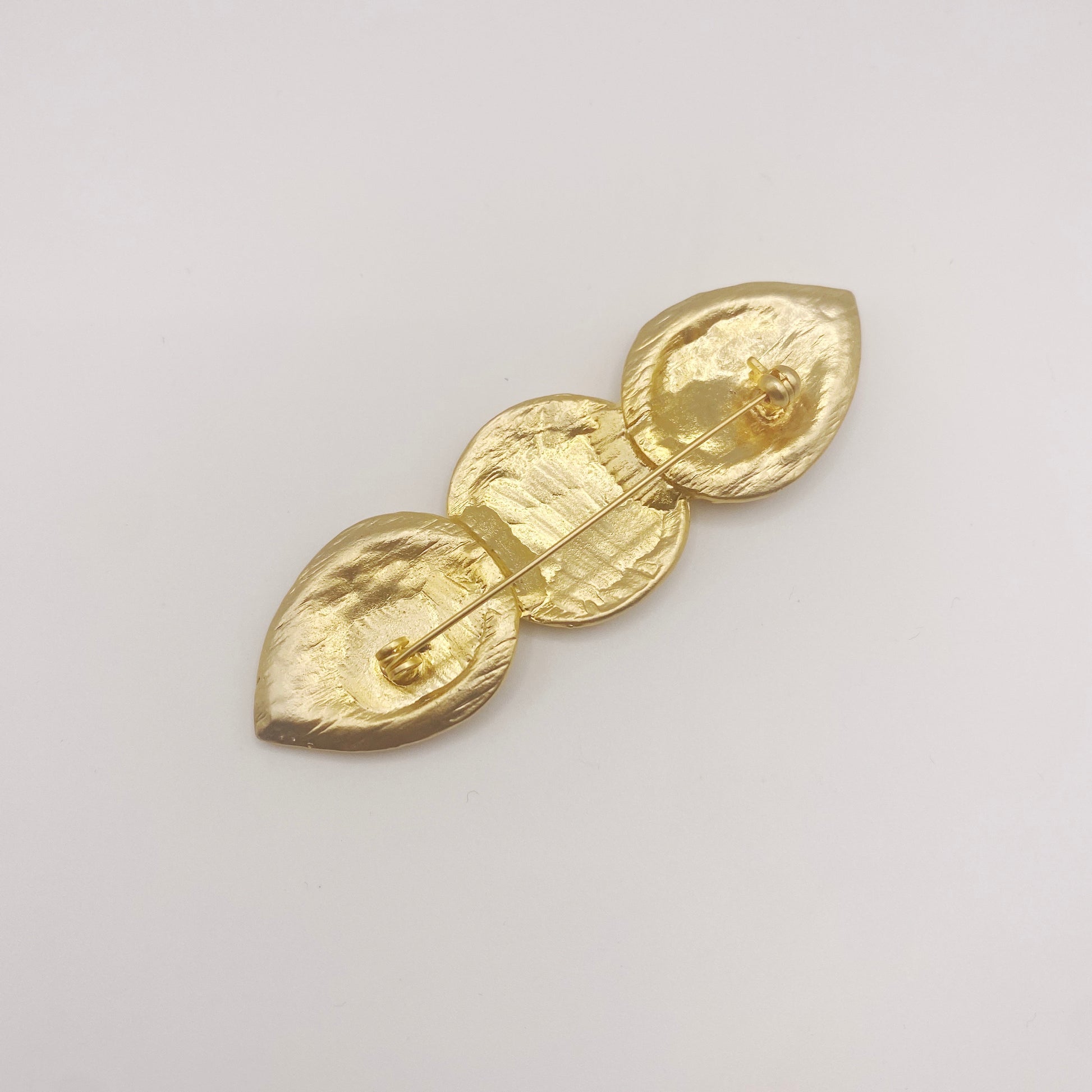 Back of vintage 1980s Egyptian Revival brooch showing clasp and excellent vintage condition.