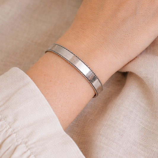 1980s Birmingham silver hinged bangle, style shot. 