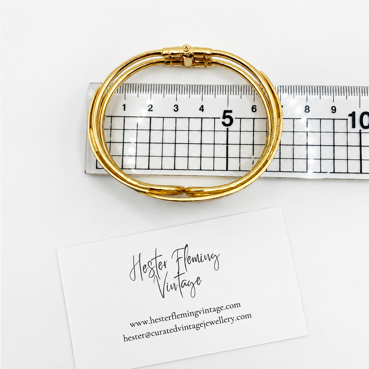 1980s Cloisonne Bangle, placed on a ruler for size. 
