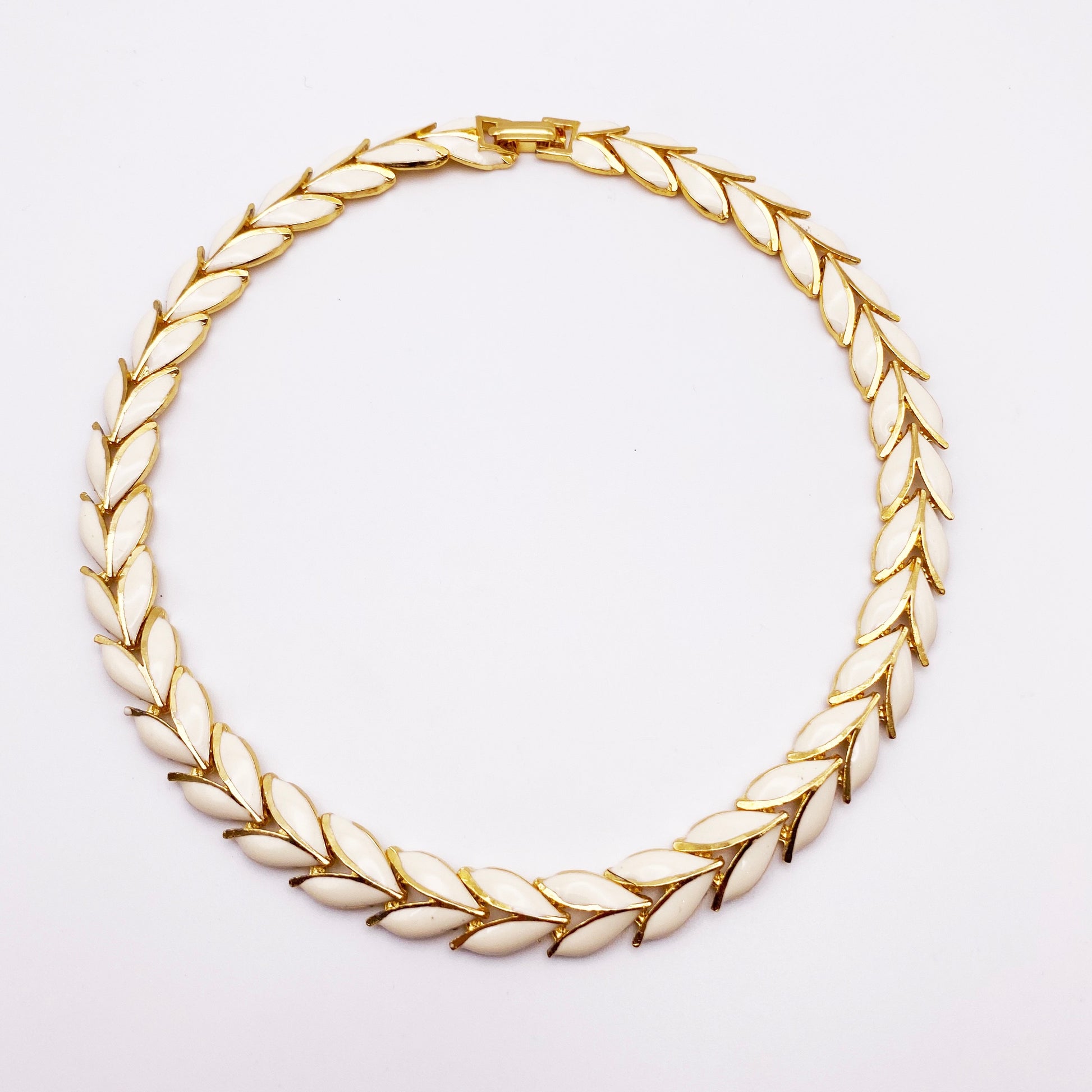 1980s Enamel Leaf Collar Necklace on white background.