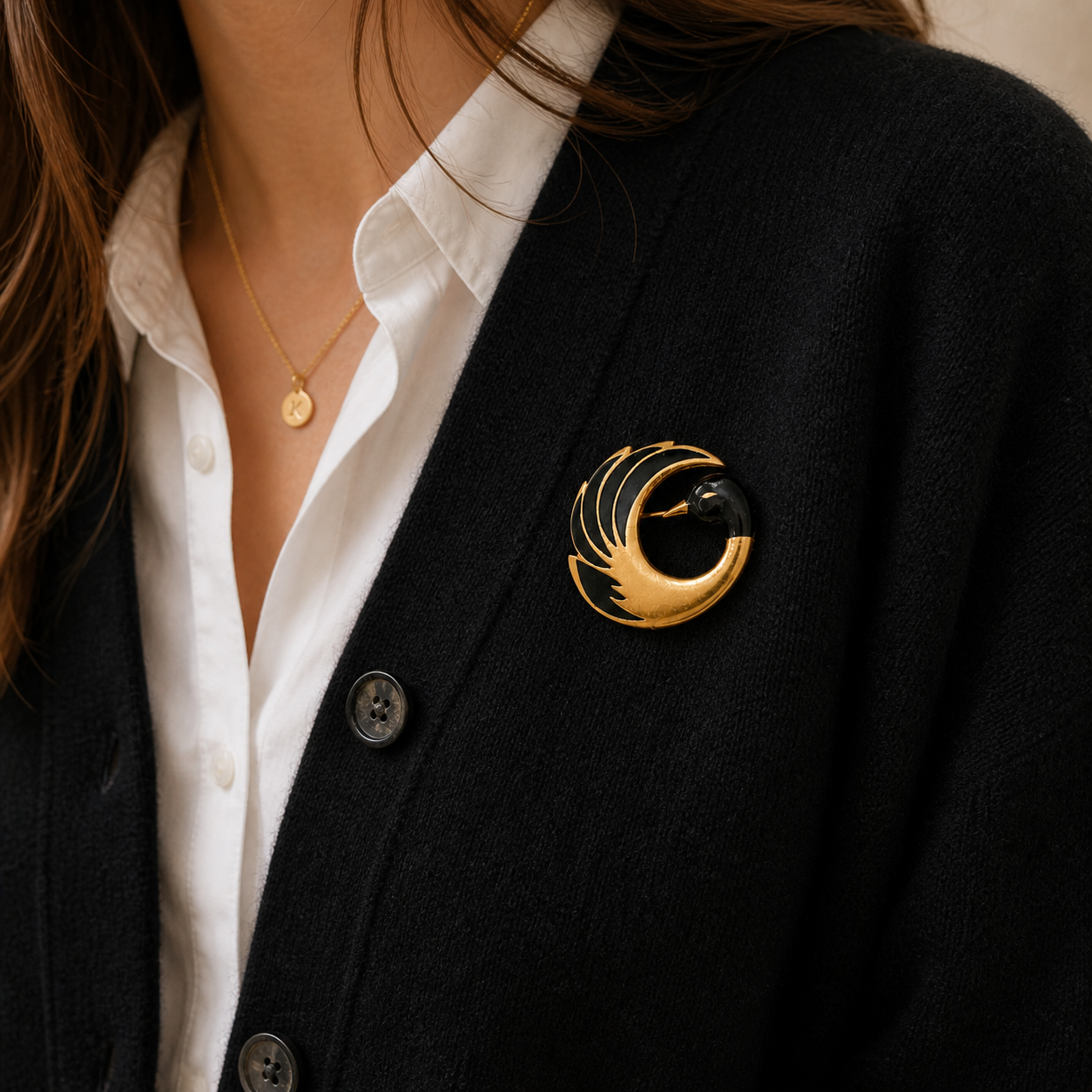 1980s Orena Paris Swan Brooch Style Shot on black cardigan. 