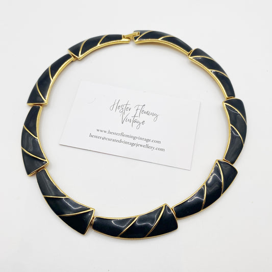 1980s vintage Trifari necklace in black enamel and gold-tone finish