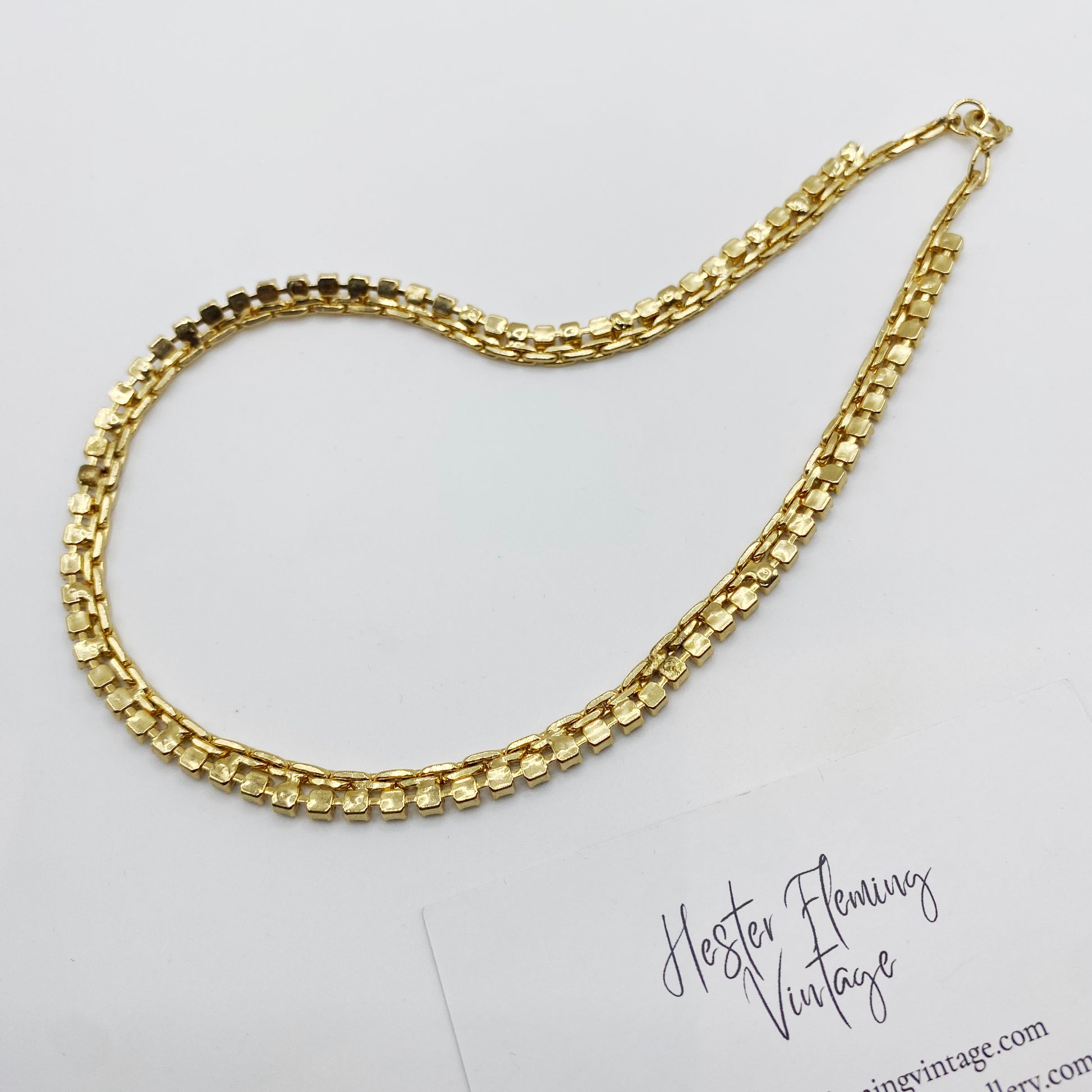 1990s 22kt gold plated Swarovski crystal necklace back view.