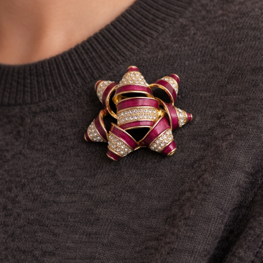 1990s Napier enamel and crystal brooch, styled on grey knit. 